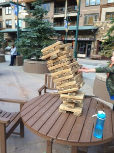 Jonathan's move in the giant Jenga game made the tower tumble! He thought he was in trouble!