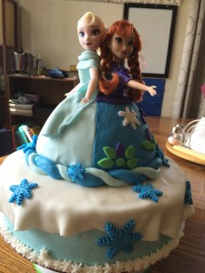 Elsa and Anna doll cake